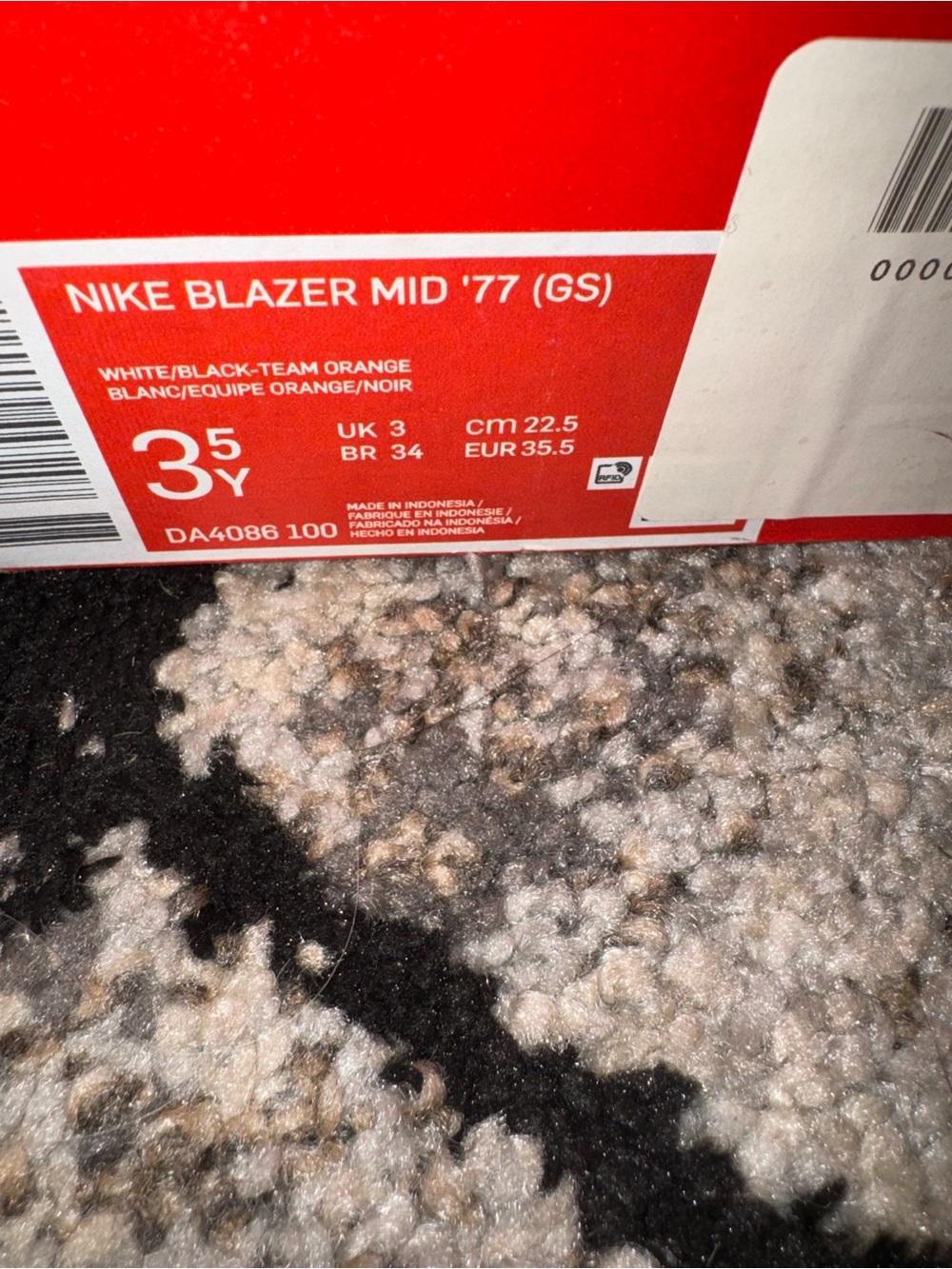 Nike White High-Top Sneakers with Black Swoosh and Red Tongue Logo - Picture 4 of 4